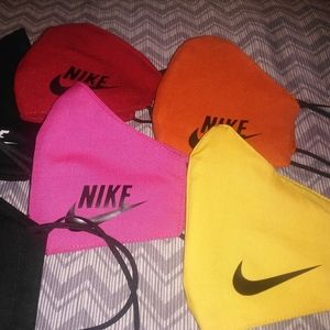 Yellow mask with nike logo